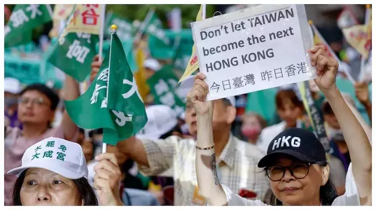 China 'स्पष्ट रूप से' ताइवान के लोकतंत्र में हस्तक्षेप करने की कोशिश