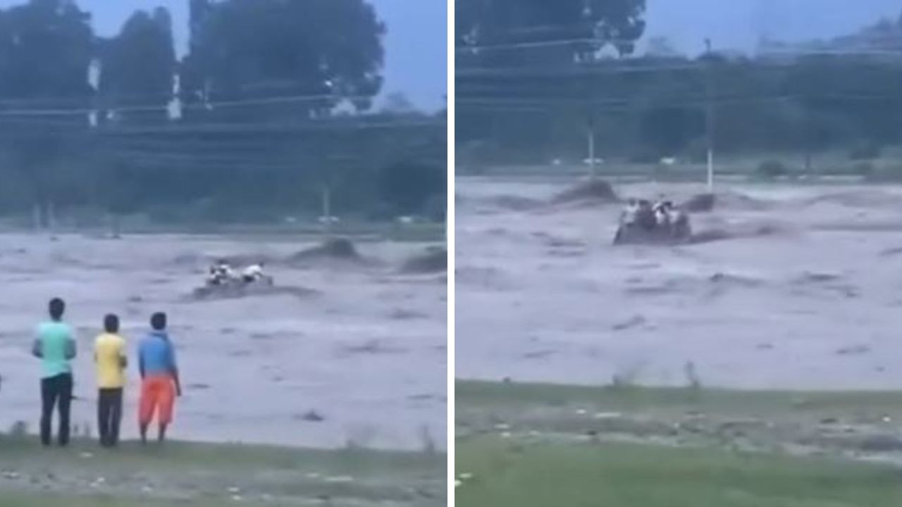 देहरादून के विकासनगर क्षेत्र में क्लाउडबर्स्ट से आई बाढ़ में मजदूरों से...
